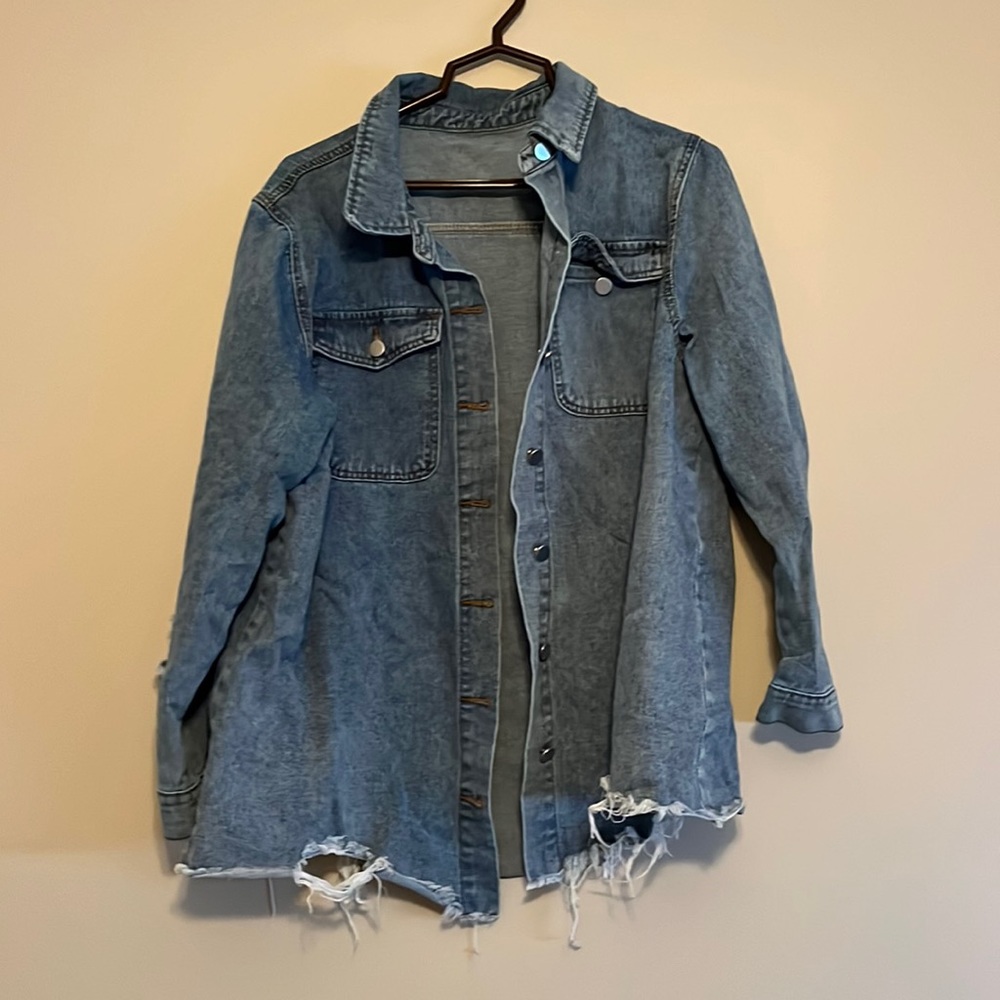 Distressed denim jacket